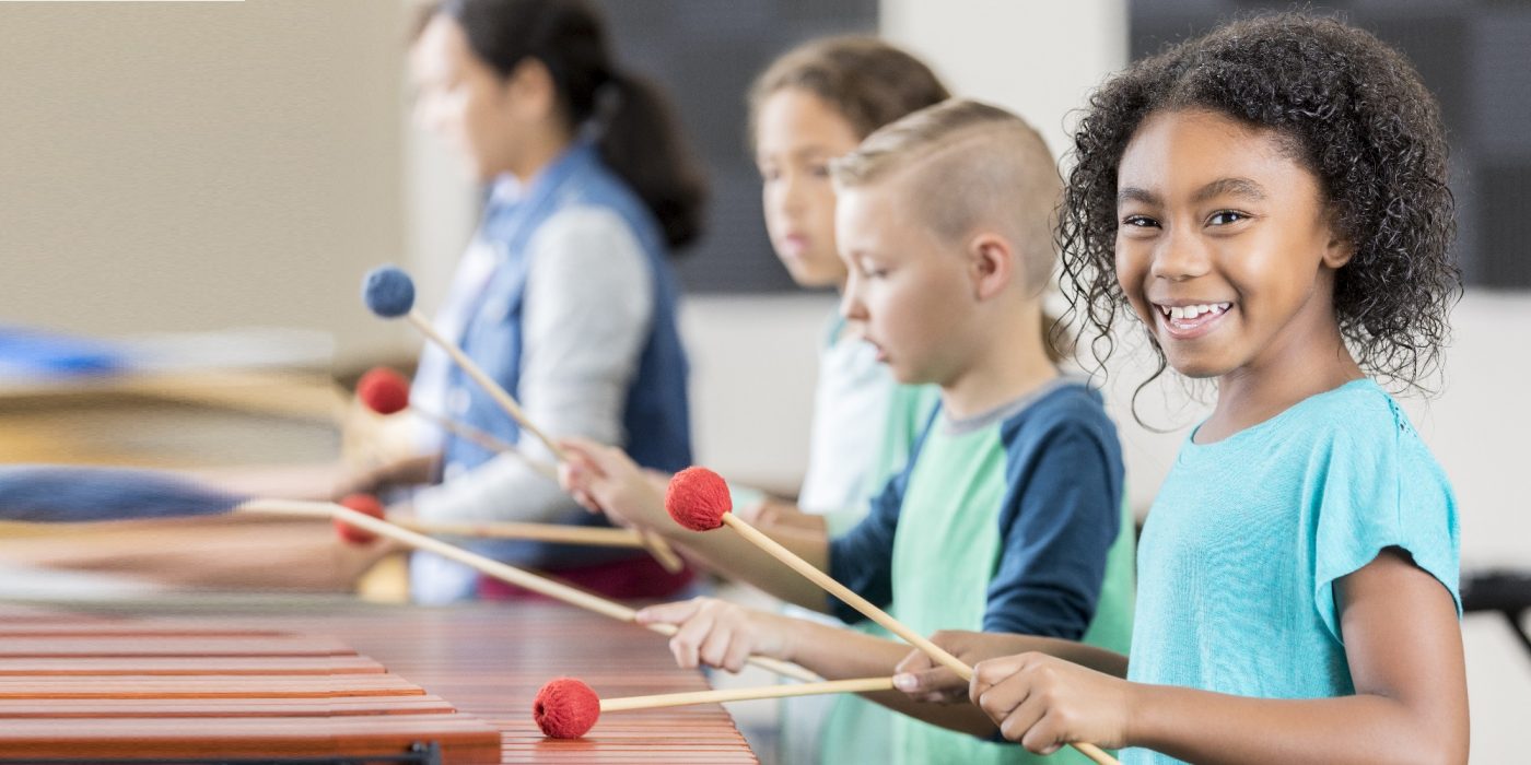 Children playing the drums